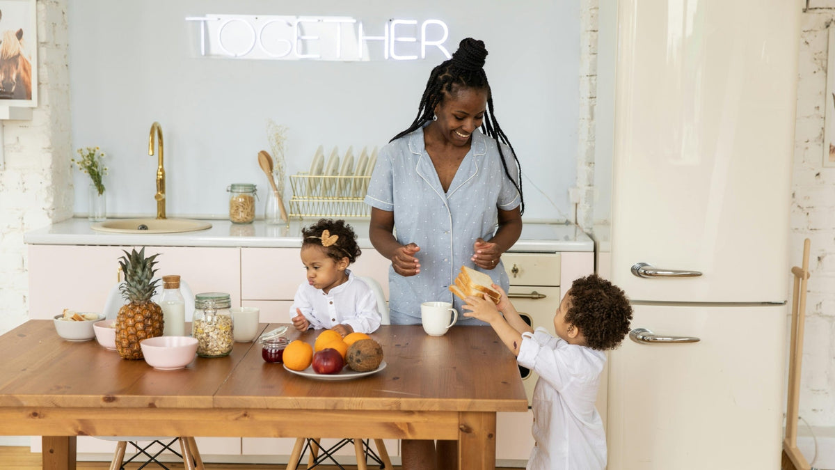 Mom with her kids in the kitchen